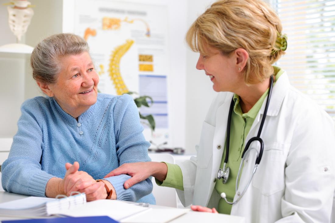 Woman speaking with a healthcare professional